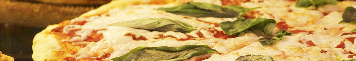 Eating Italian Pizza at Sarafino's Homestyle Italian restaurant in Pittsburgh, PA.